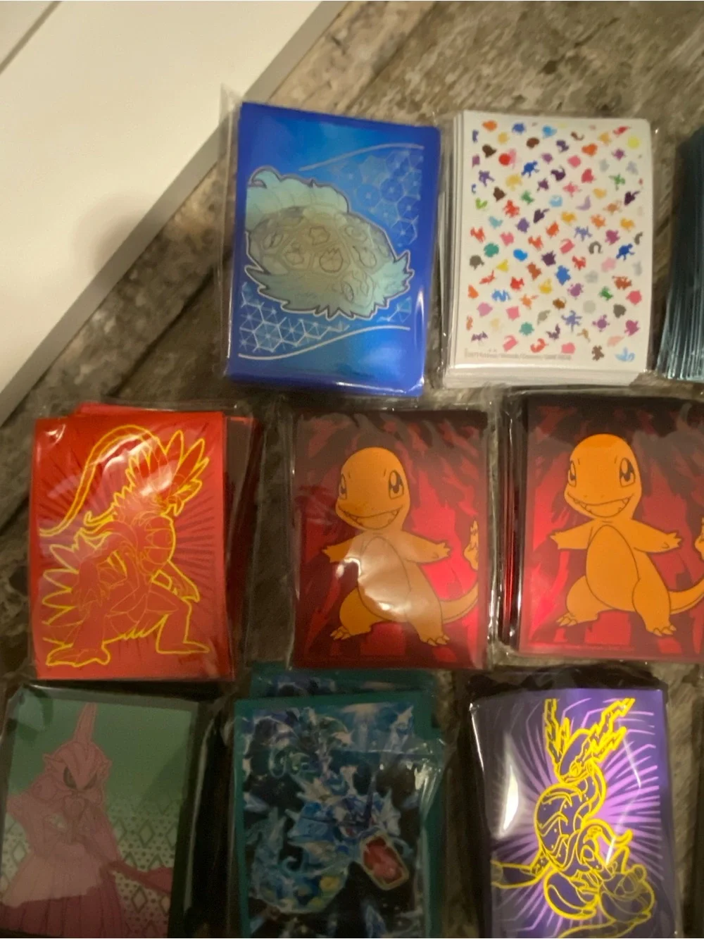 Assorted Pokémon Card Sleeve packs- Multi Color Designs
